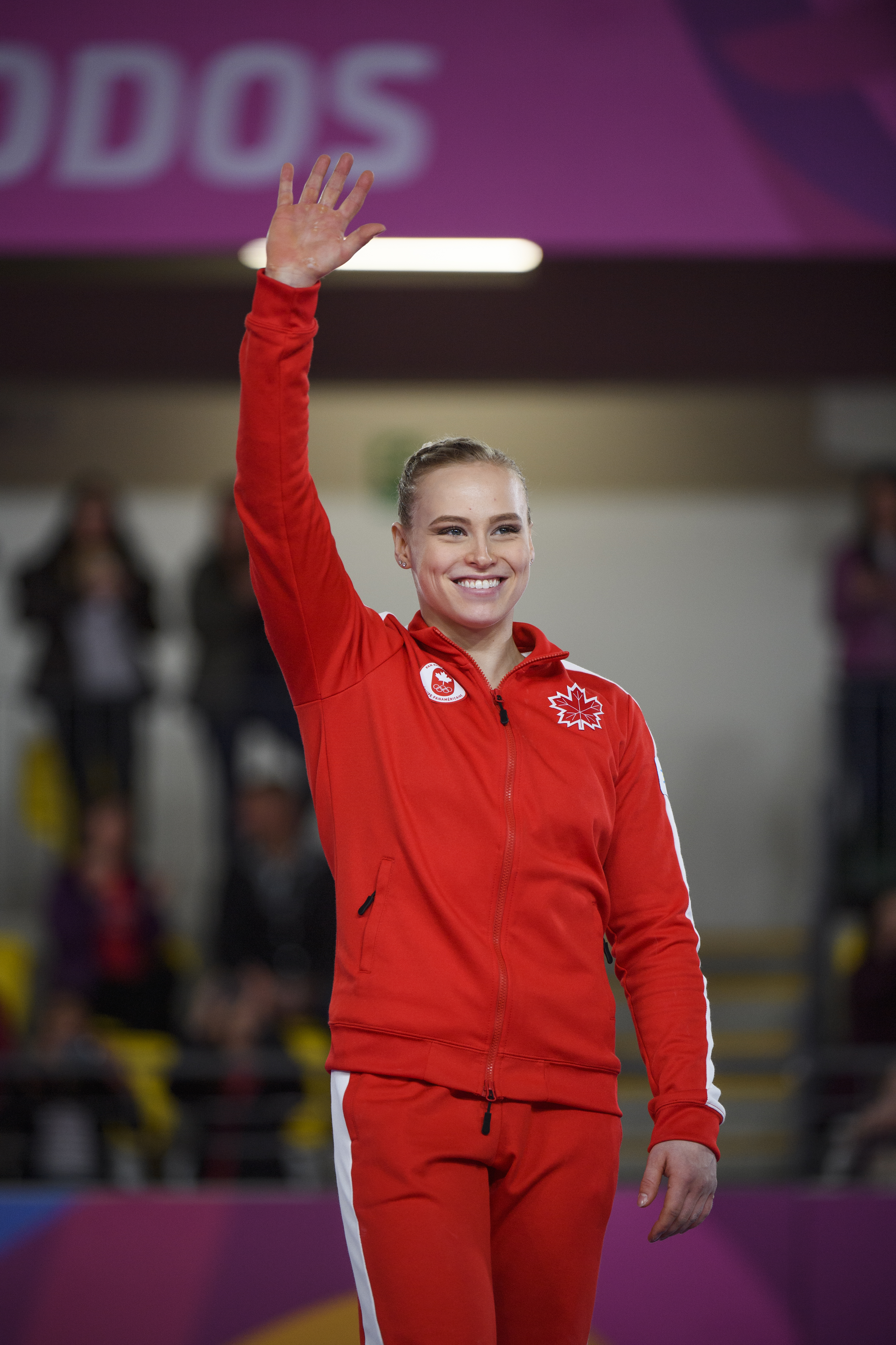 ellie black waves to the crowd