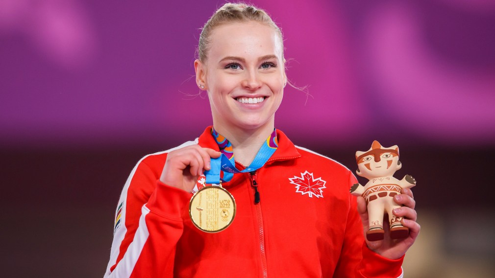 Ellie Black poses with medal