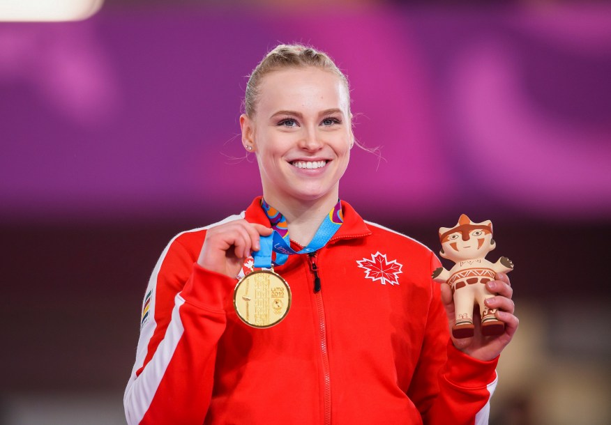 Ellie Black poses with medal
