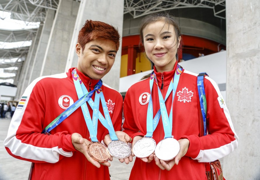 Assadian Jr. (left) and Jinsu Ha, pose for photos with their medals