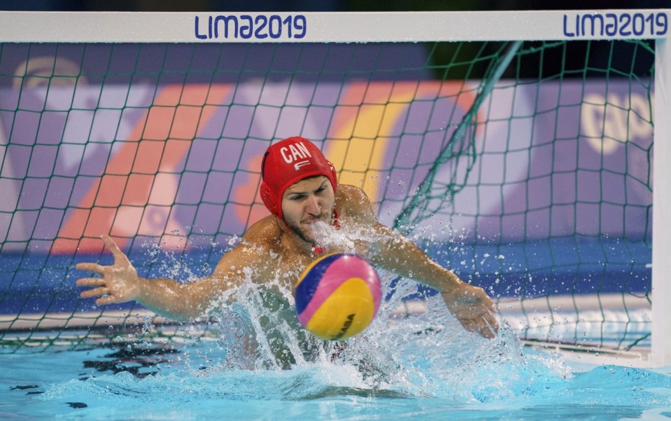 Milan Radenovic swatting ball away