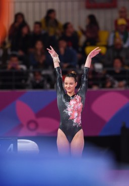 gymnast presents to the judges