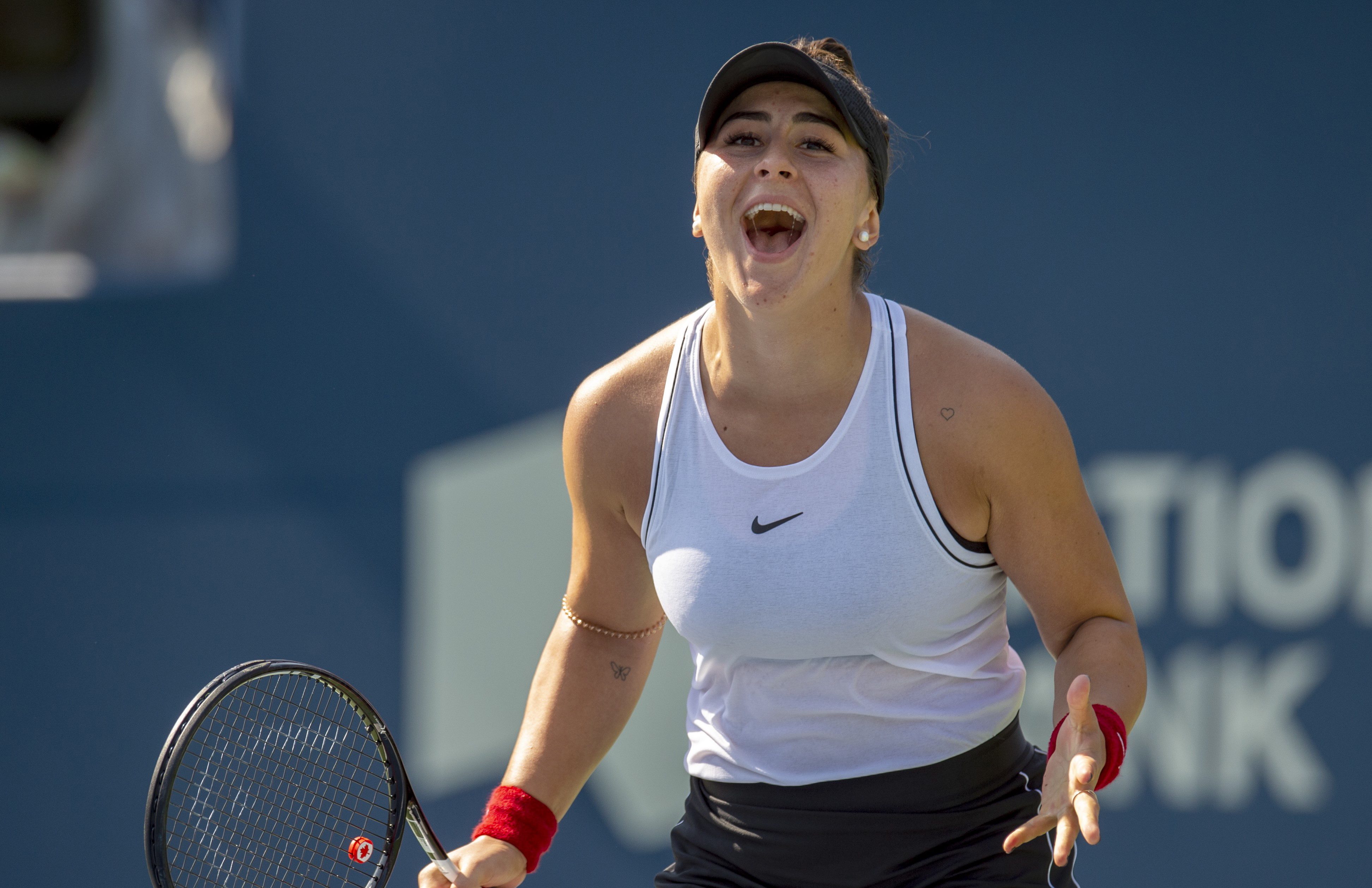 Bianca celebrates during a match at the Rogers Cup.