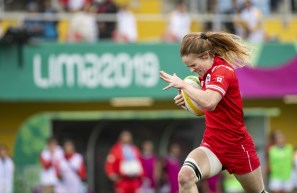 Emma Chown of Canada runs the ball