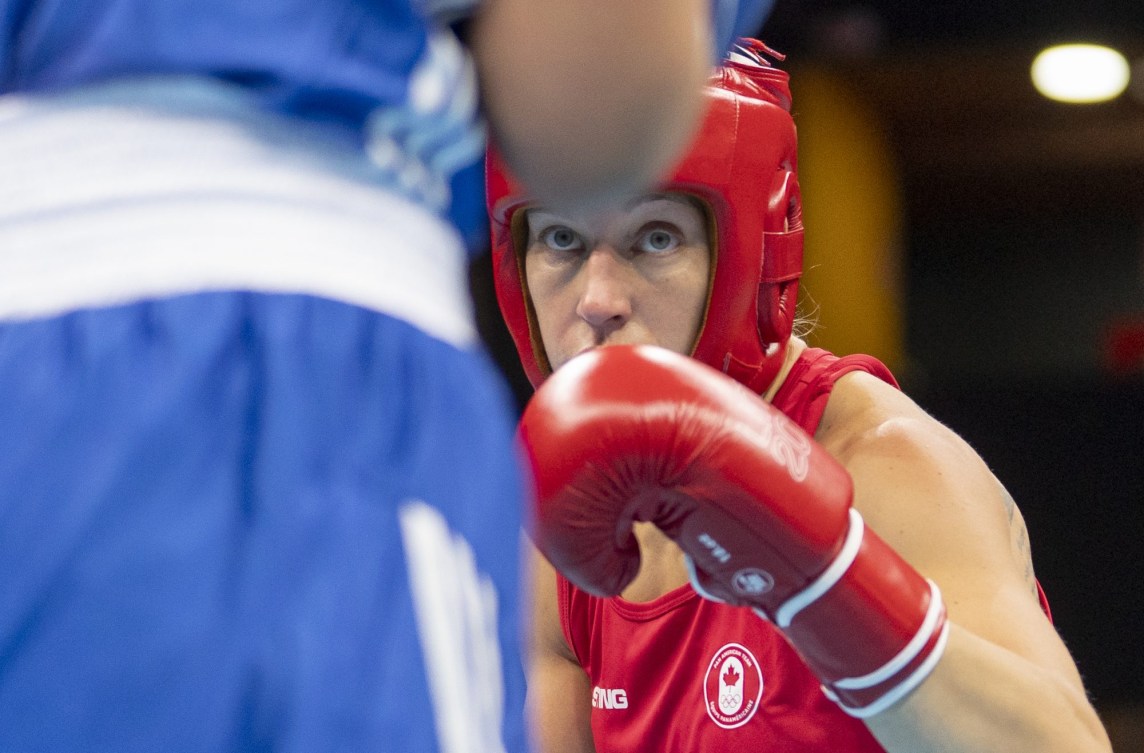 boxer protects her face