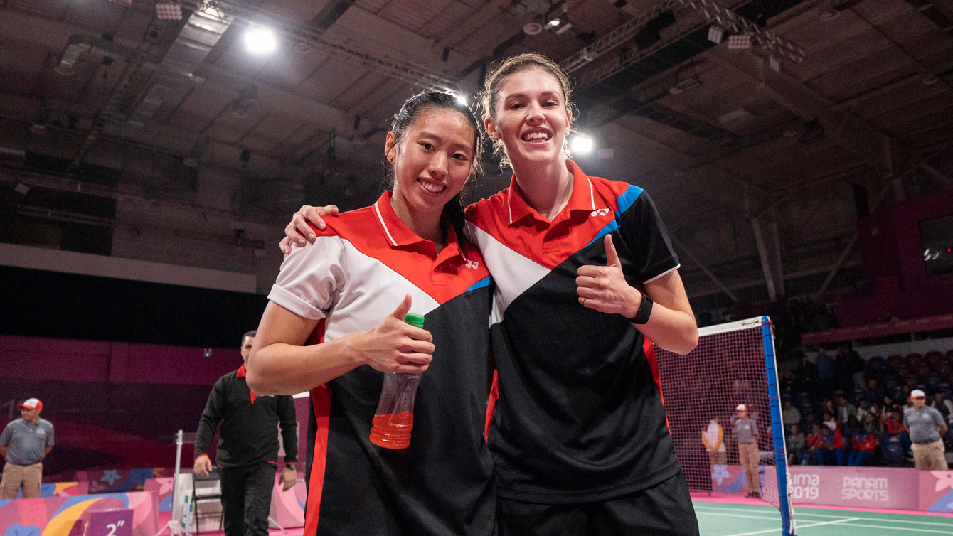 Rachel Honderich and Kristen Tsai give a thumbs up after their match