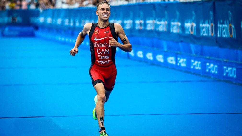 Triathlete Tyler Mislawchuk races to the finish line at the Toyko 2020 test event.