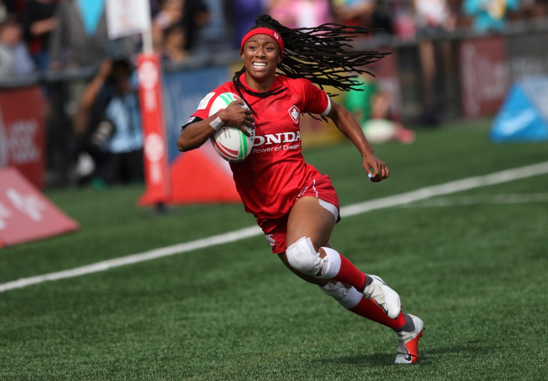 Canada's Charity Williams runs in for a try