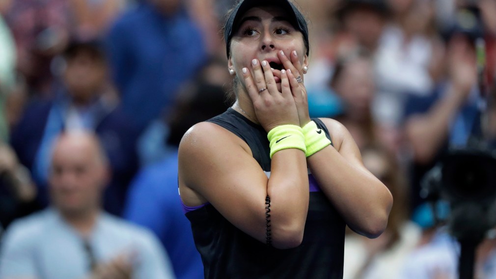 Bianca Andreescu, of Canada, reacts after defeating Serena Williams