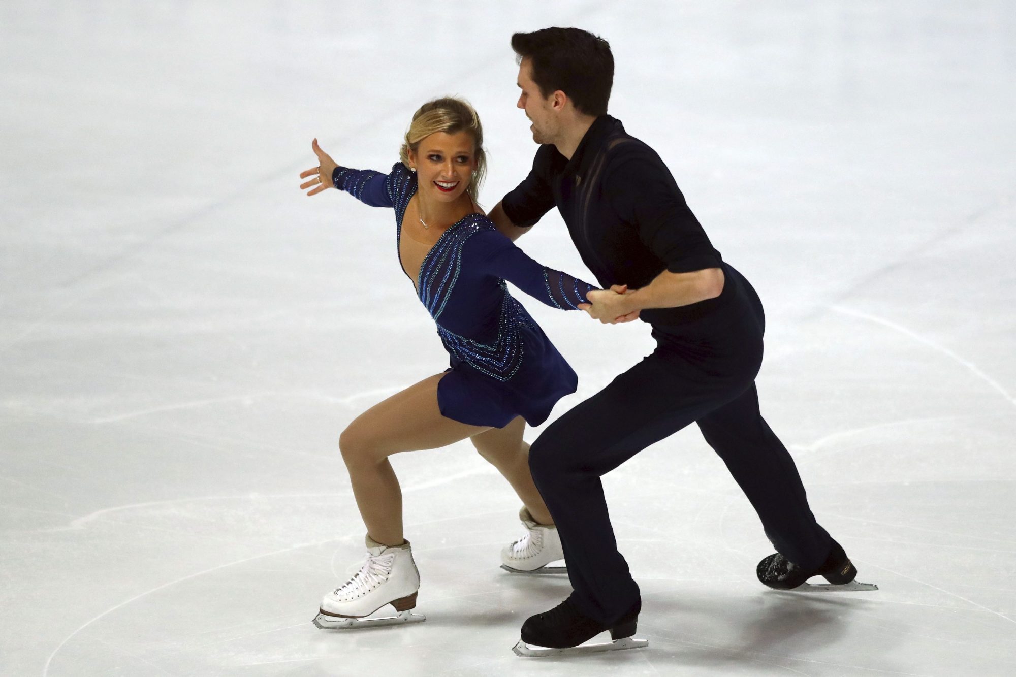 Kirsten Moore-Towers and Michael Marinaro of Canada skating