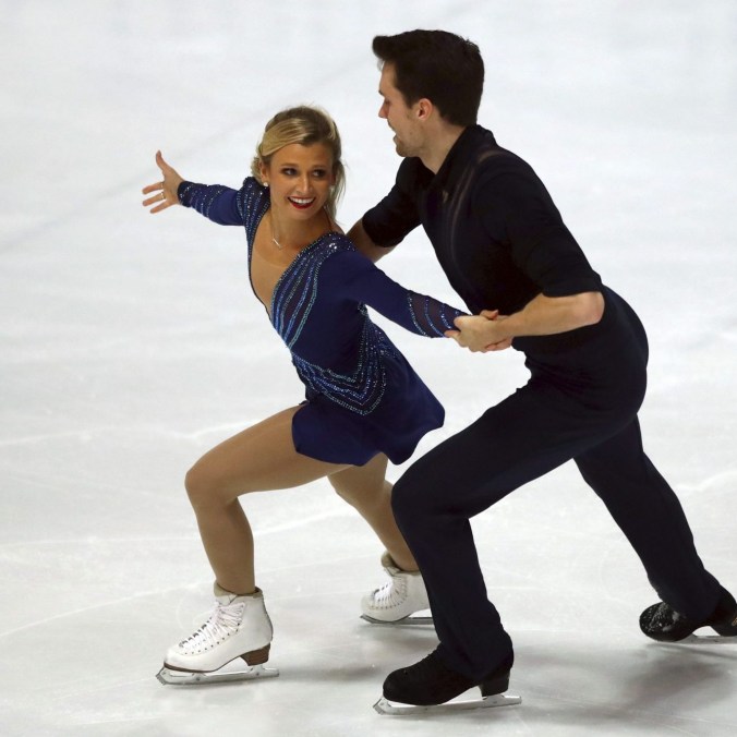 Kirsten Moore-Towers and Michael Marinaro of Canada skating