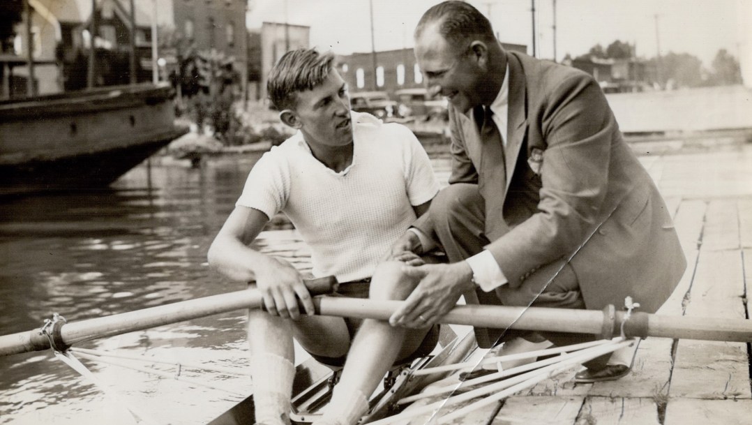 Bobby Pearce, right, speaking with a rower