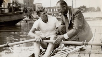 Bobby Pearce, right, speaking with a rower