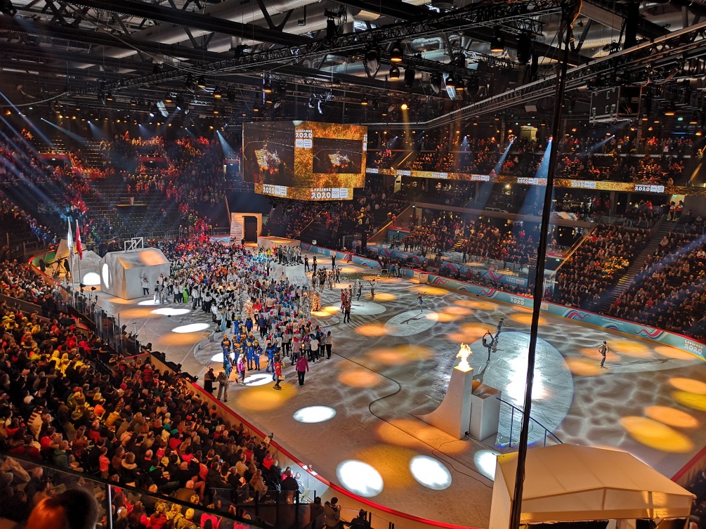 A large crowd gathers in an ice hockey arena for the 2020 Youth Olympic Games in 	Lausanne, Switzerland.
