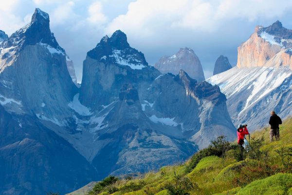 Scenic view of hikers with the mountains in the back.