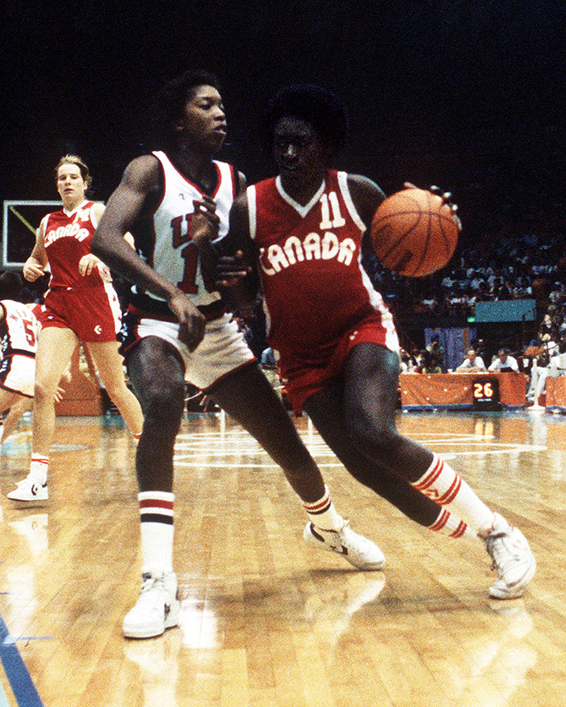 Sylvia Sweeney dribbling past defender