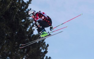 Marielle Thompson of Canada flies off the jump in the women's quarter-finals on her way to winning gold during the FIS Ski Cross World Cup 2017 in The Blue Mountains, Ont., Sunday, March 5, 2017. THE CANADIAN PRESS/Mark Blinch