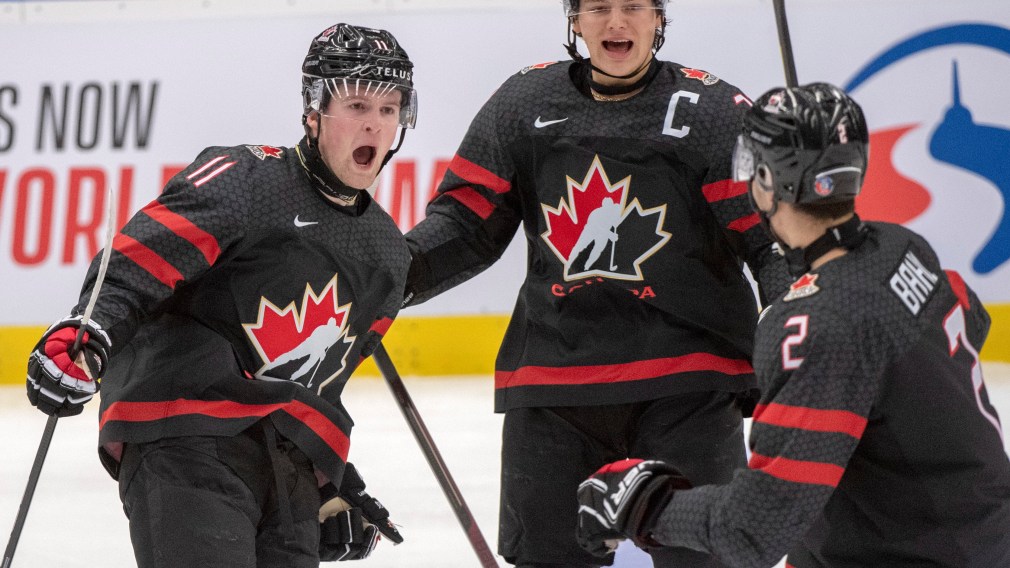 Canada's Alexis Lafreniere, left, celebrates his goal with teammates Barrett Hayton and Kevin Bahl (2) during first period semifinal action against Finland at the World Junior Hockey Championships on Saturday, January 4, 2020 in Ostrava, Czech Republic. THE CANADIAN PRESS/Ryan Remiorz