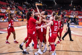 Team Canada basketball players celebrates their win at the FIBA Women's Olympic Qualifying Tournament