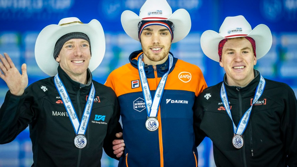 Ted-Jan Bloemen and Graeme Fish stand on the podium after capturing silver and bronze in speed skating