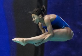 Jennifer Abel of Canada performs a dive during the women's 3-metre springboard final at the FINA Diving World Series in Montreal, Sunday, March 1, 2020. THE CANADIAN PRESS/Graham Hughes