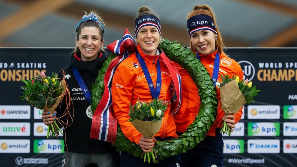 From left, Canada's silver medalist Ivanie Blondin, gold medalist Ireen Wust of the Netherlands and bronze medalist Antoinette de Jon of the Netherlands pose on the podium during the women's medal ceremony at the World Cup skating All-round 2020 in the Viking ship at Hamar, Norway, Sunday, March 1, 2020. (Geir Olsen/NTB Scanpix via AP)