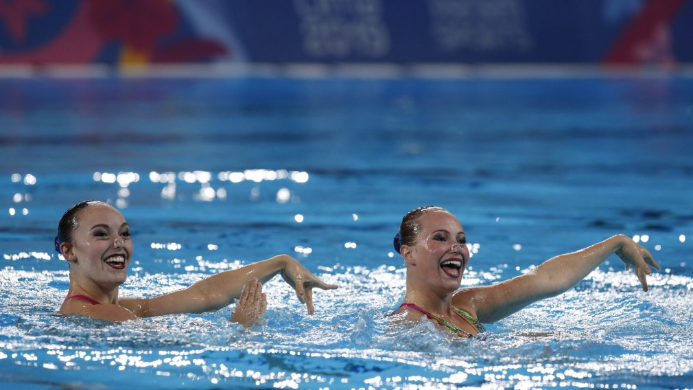 Jacqueline Simoneau and Claudia Holzner, of Canada, compete to win the gold medal in the artistic swimming duet technical routine final at the Pan American Games in Lima, Peru, Wednesday, July 31, 2019.
