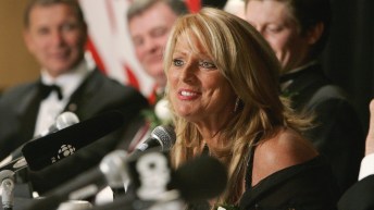 Julie Sauve at a press conference table