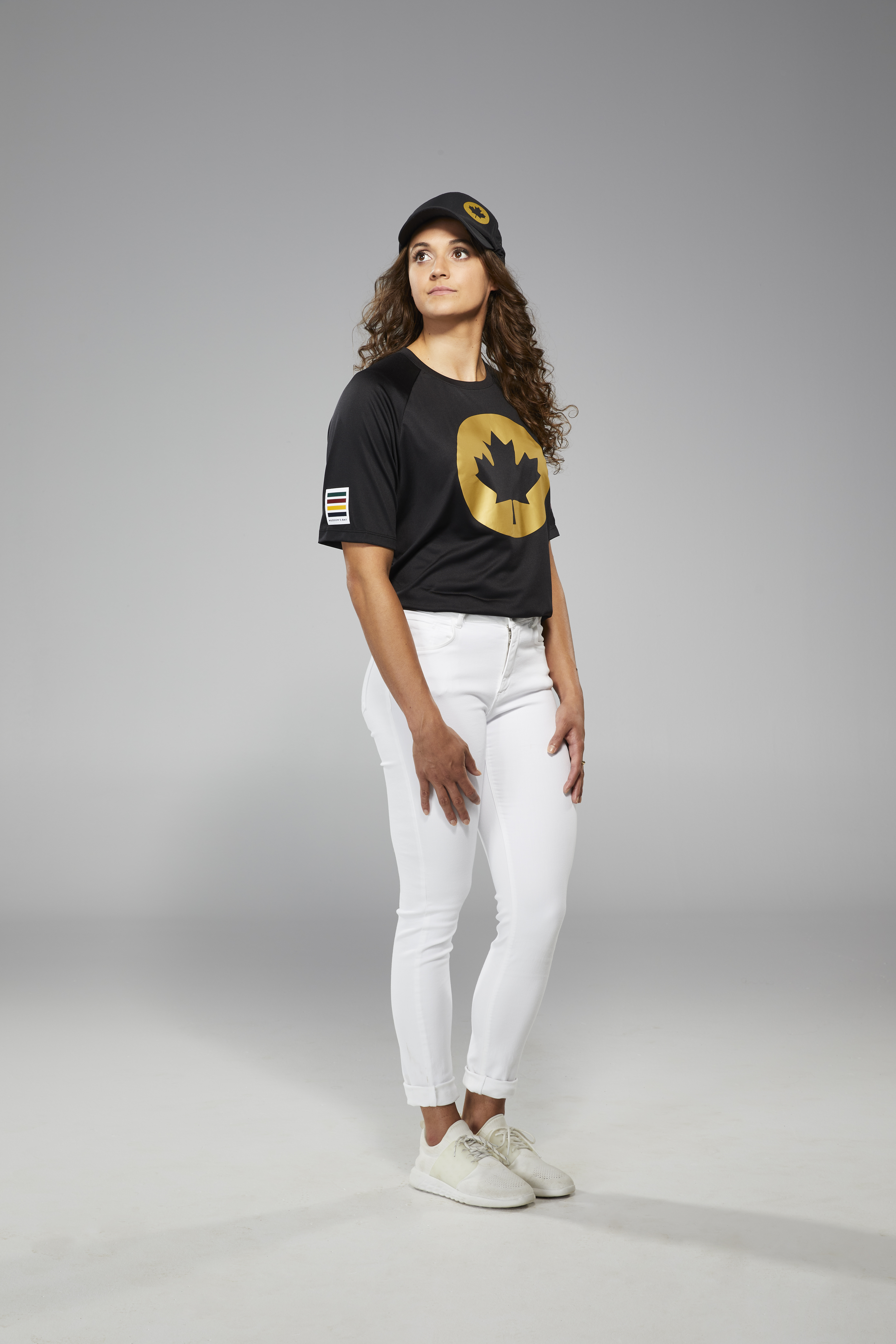 Kylie Masse is facing the camera in Tokyo 2020 closing ceremony t-shirt and jeans