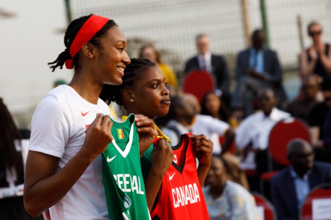 Kayla Alexander in Senegal Kayla Alexander poses with a Senegal basketball jersey