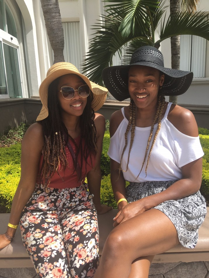Kayla and Kesia Alexander Kayla and Kesia Alexander sitting outside