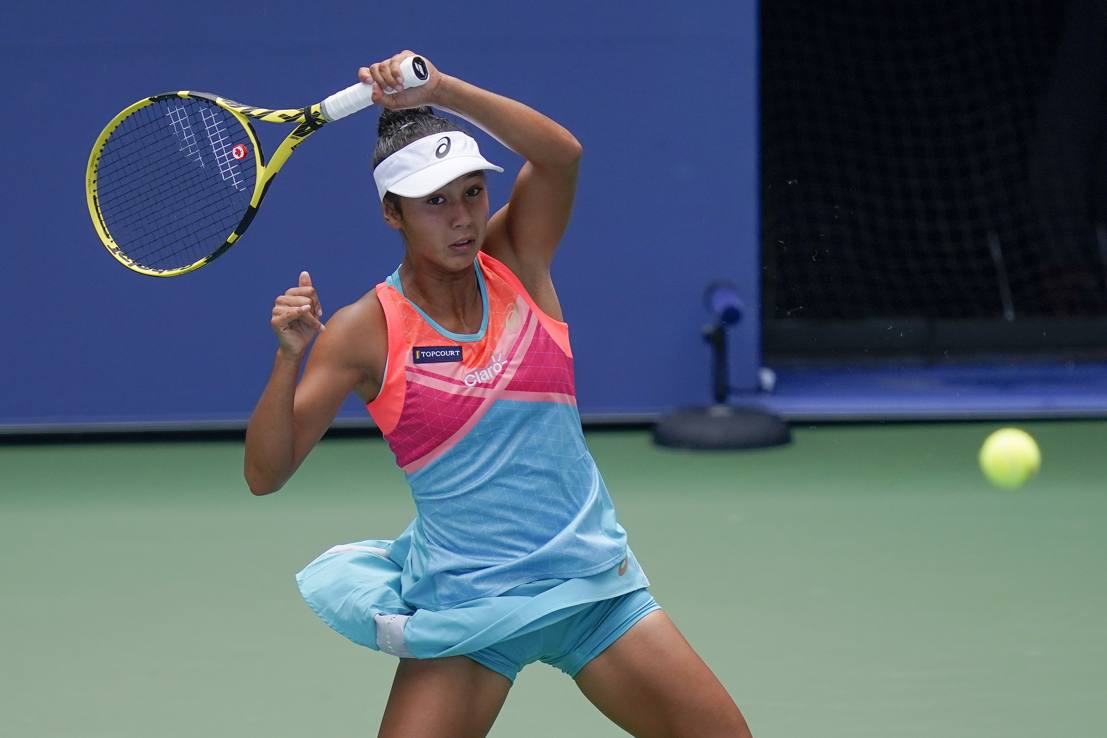 Leylah Fernandez, of Canada, returns a shot to Sofia Kenin, of the United States, during the second round of the US Open tennis championships, Thursday, Sept. 3, 2020, in New York. (AP Photo/Seth Wenig)