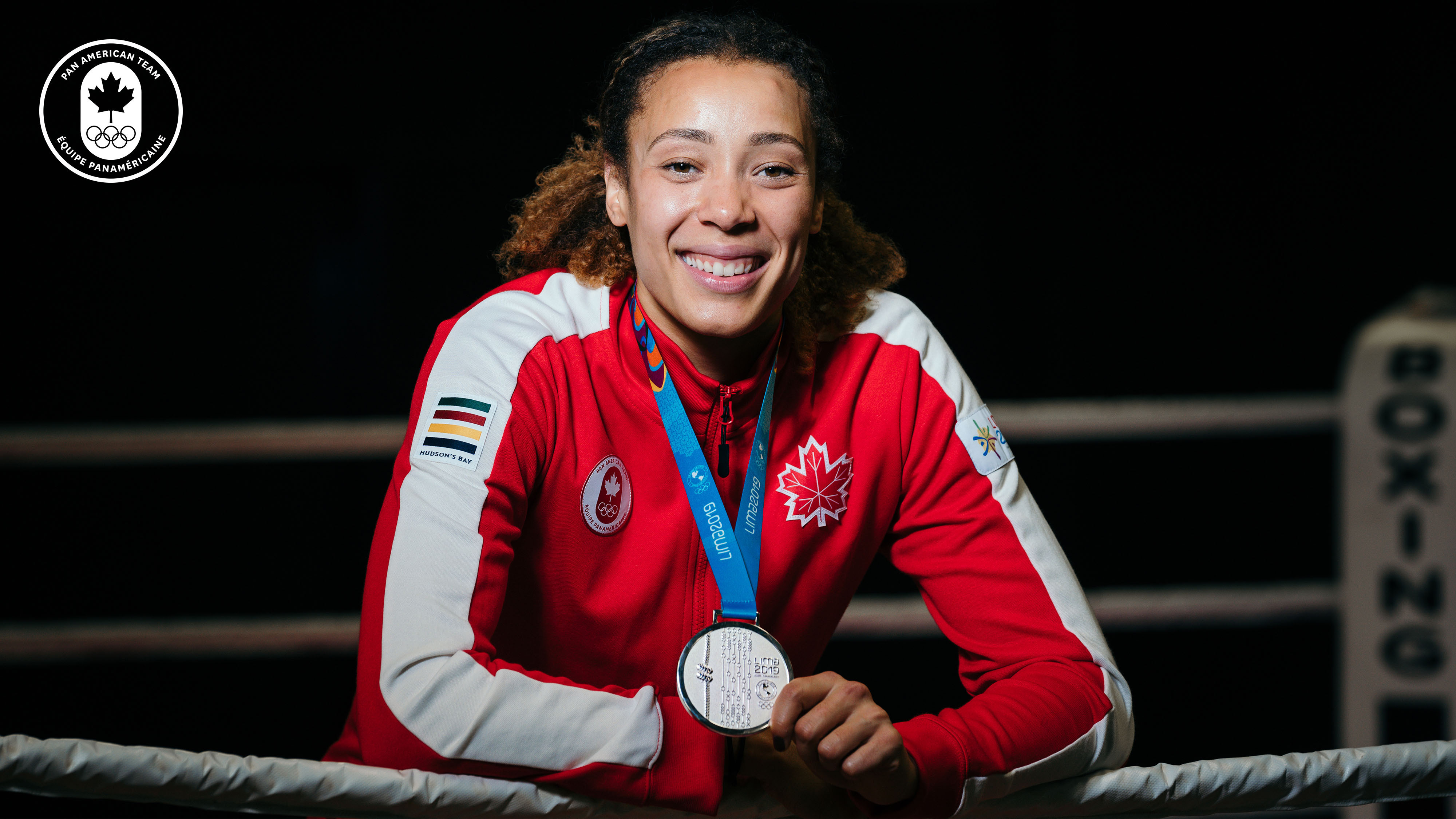 Tammara Thibeault wears silver medal