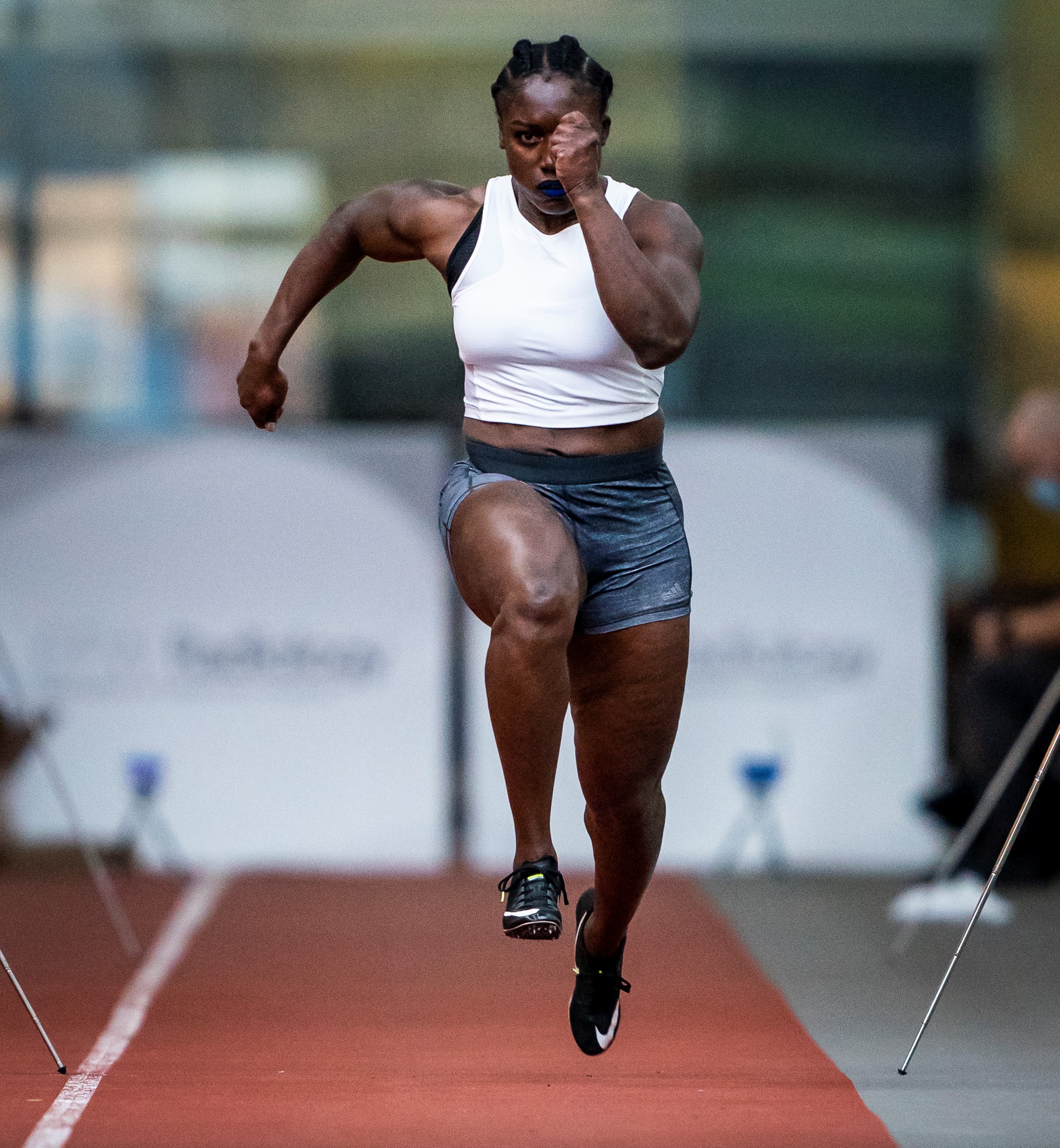 Cynthia Appiah running on a track 