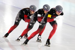 Valerie Maltais, center, Ivanie Blondin, left, and Isabelle Weidemann, right, compete during the women's team pursuit race.