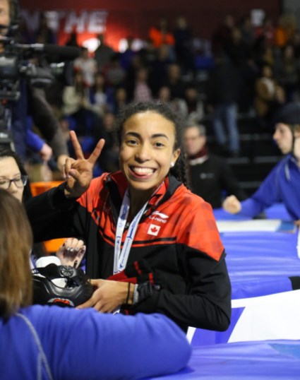 Alyson Charles Calgary World Cup reax Alyson Charles shows a big smile with a trophy
