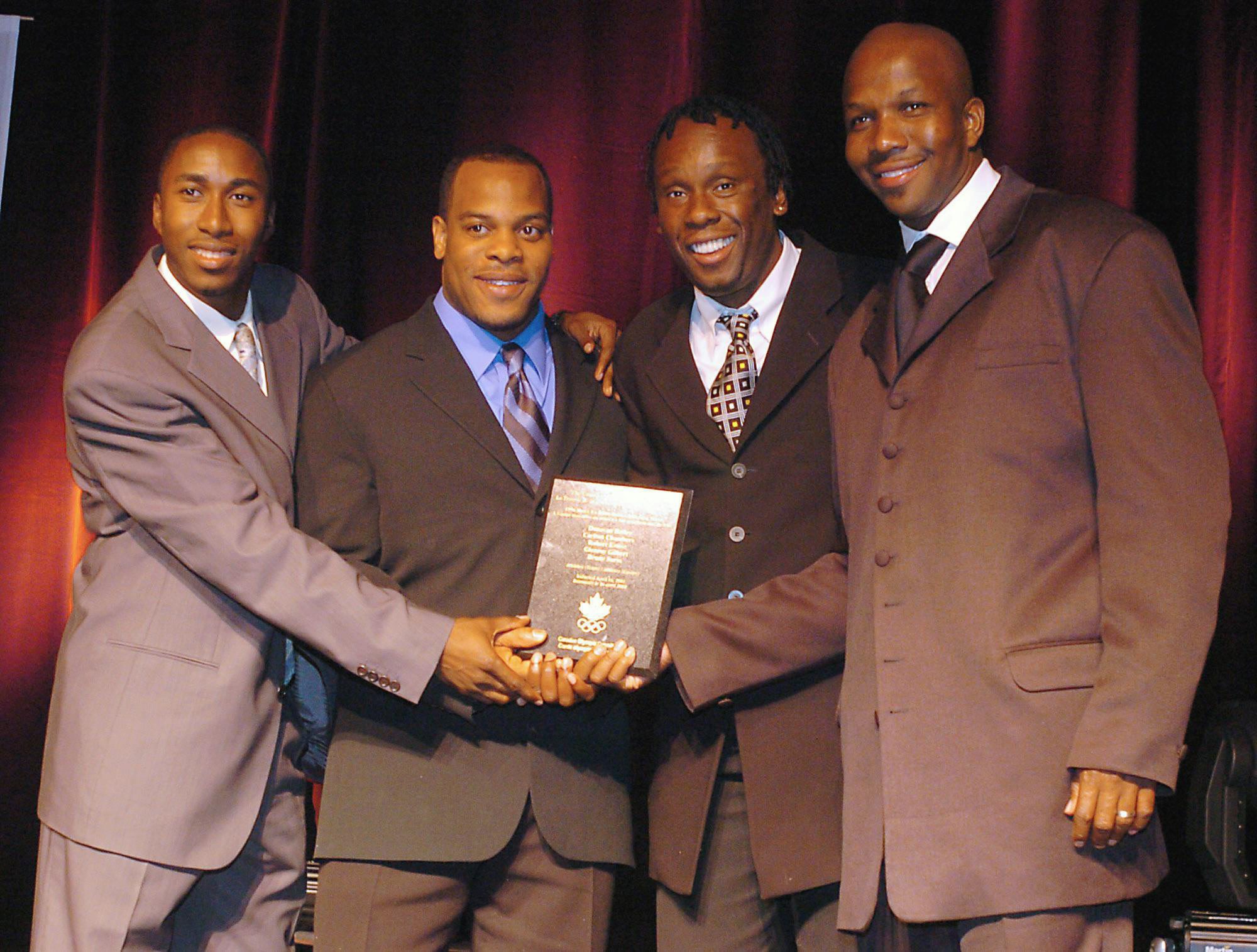 New inductees into Canadian Hall of Fame, members of the 400m olympic race, Robert Esmie, Carlton Chambers, Bruny Surin and Donovan Bailey during a ceremony in Montreal, Friday April 16, 2004.