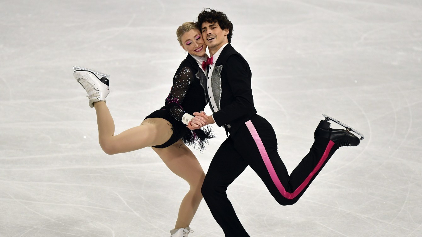 Piper Gilles and Paul Poirier of Canada perform during the Ice Dance - Rhythm Dance at the Figure Skating World Championships in Stockholm, Sweden, Friday, March 26, 2021.