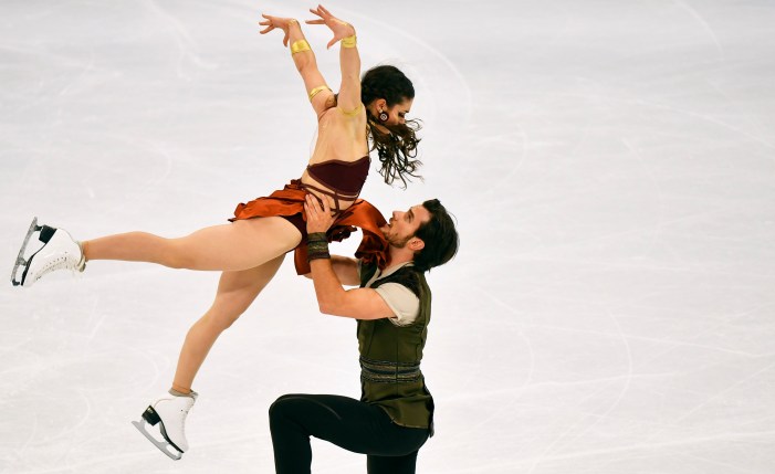 Laurence Fournier Beaudry and Nikolaj Sorensen of Canada perform during the Ice Dance-Free Dance at the Figure Skating World Championships in Stockholm, Sweden, Saturday, March 27, 2021. (AP Photo/Martin Meissner)