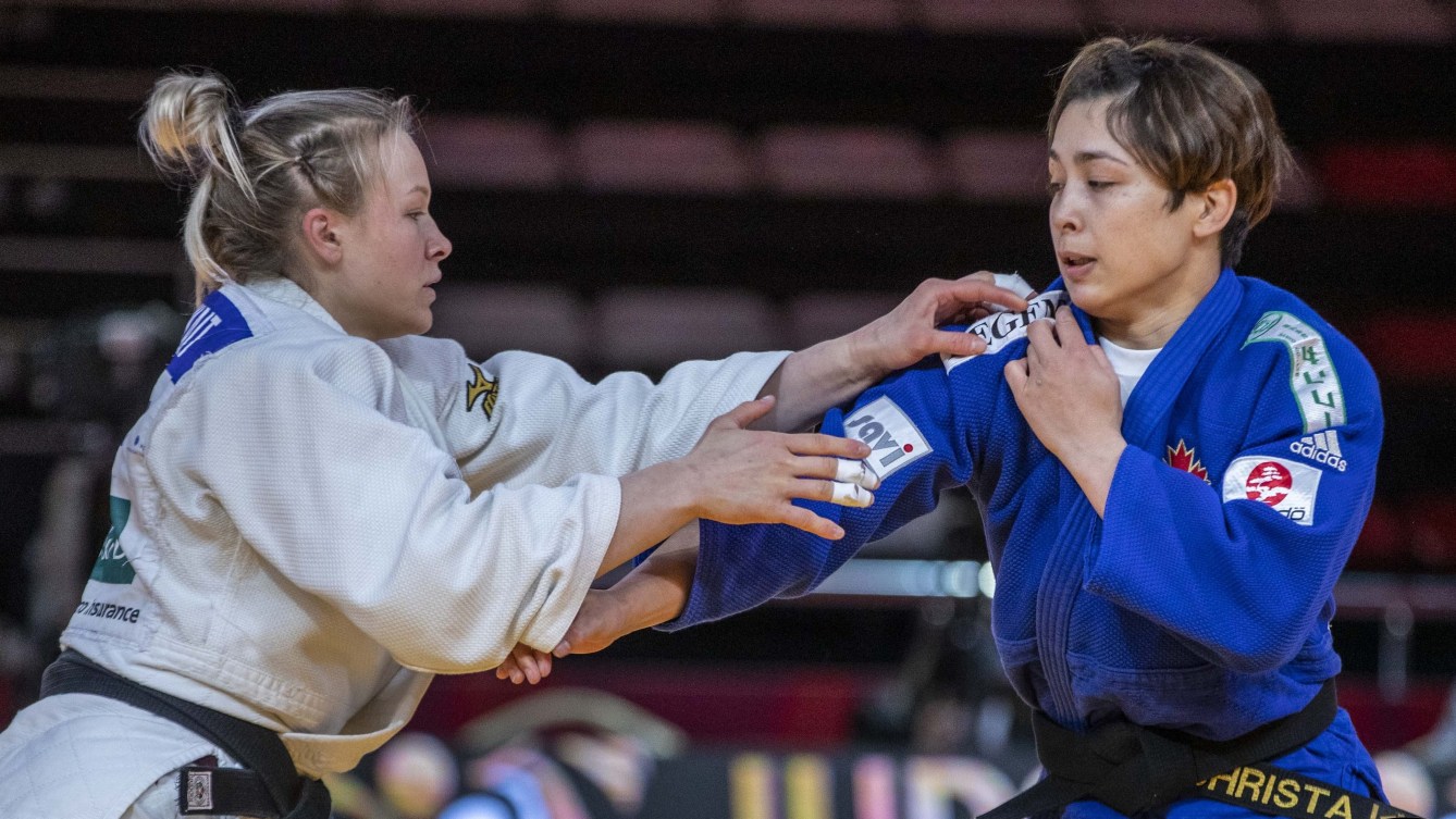 Two female judokas mid match