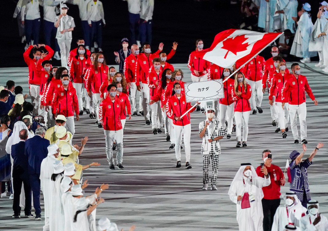 Team Canada marches into the Olympic Stadium.