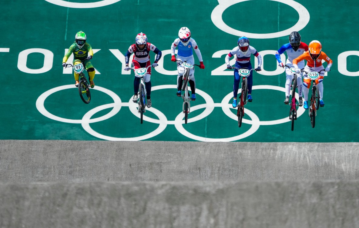 BMX riders race to the finish line