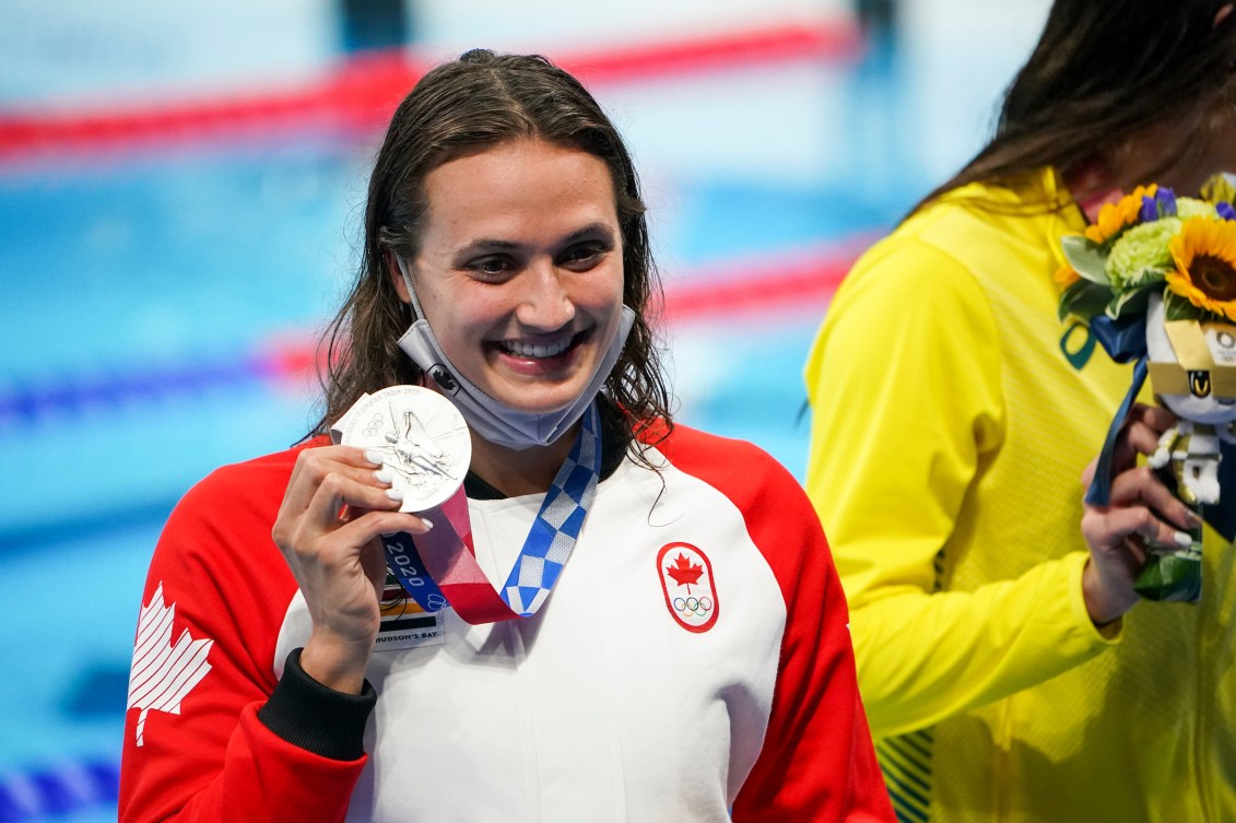 Kylie Masse holds her silver medal 