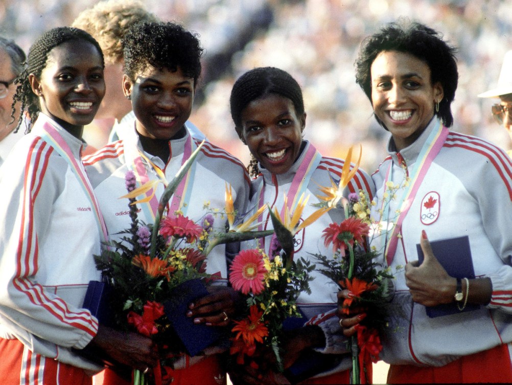 Team Canada celebrates relay medal