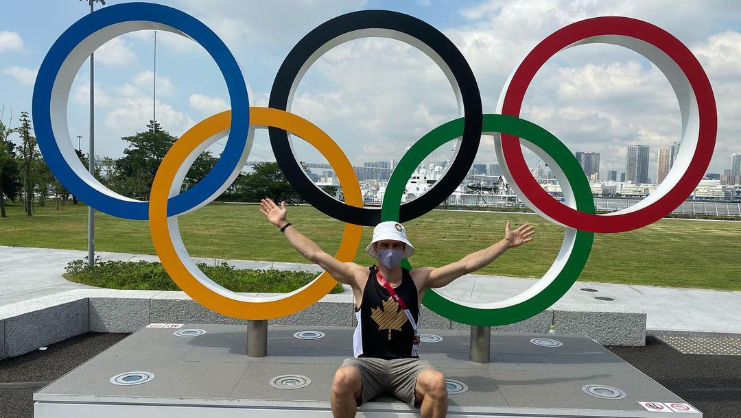 Vincent Riendeau poses in front of the Olympic Rings