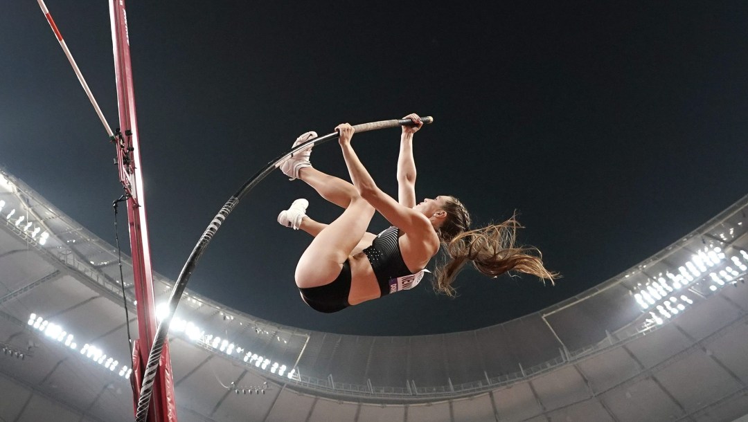 Pole vaulter going over the bar