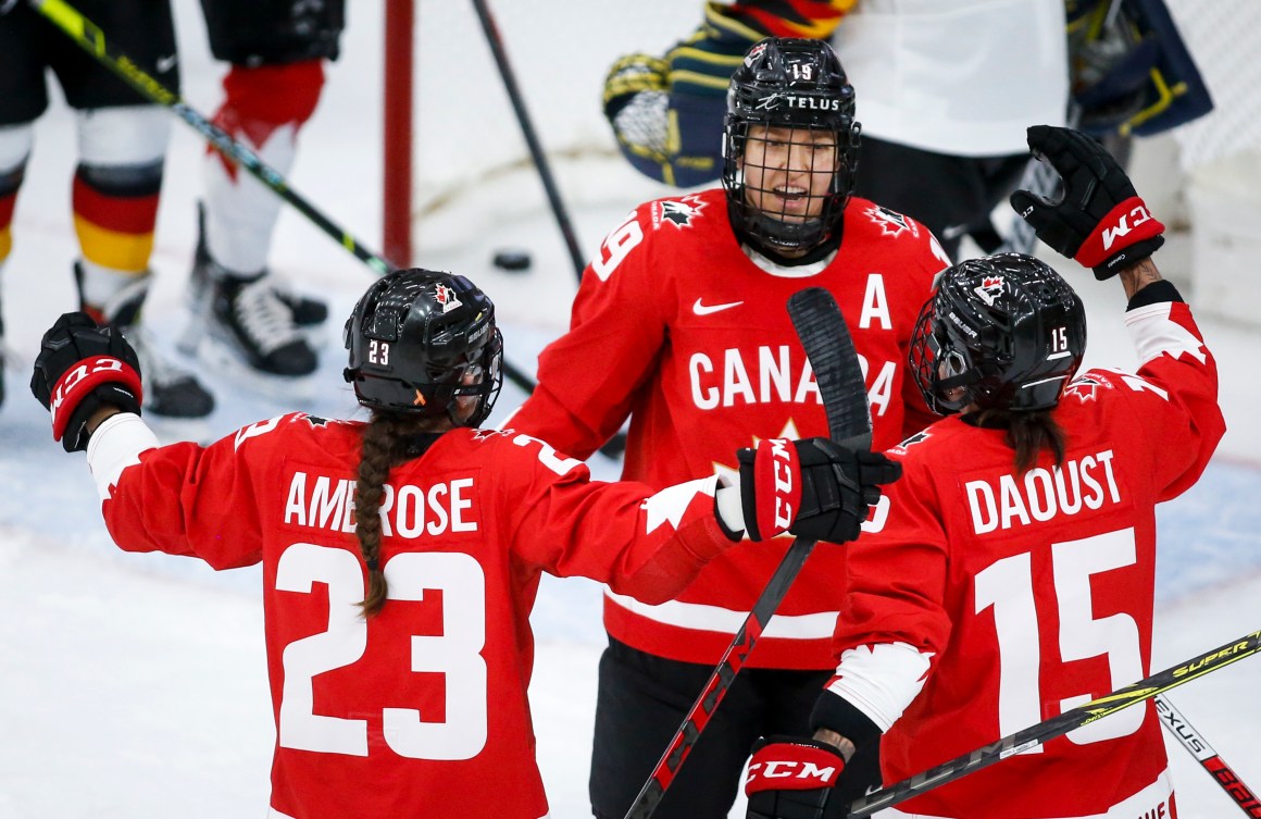 Brianne Jenner celebrates with teammates