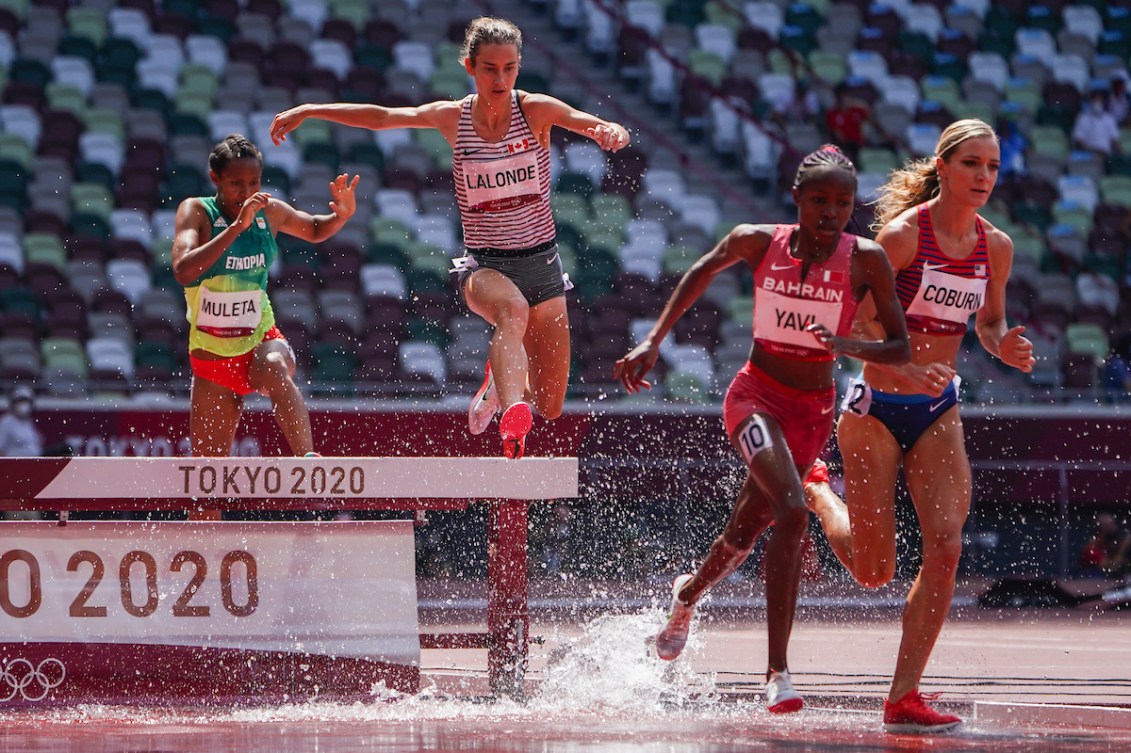 Genevieve Lalonde jumps over steeple.