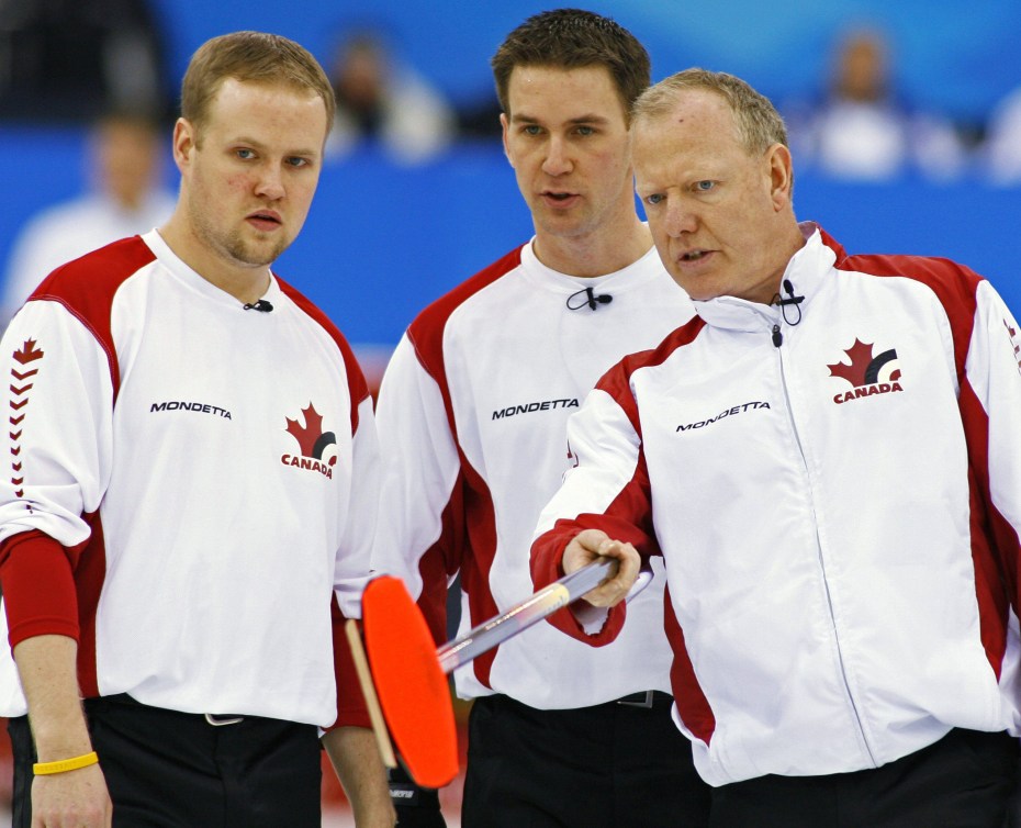 Mark Nichols, Brad Gushue and Russ Howard discuss the shot to be made at Turin 2006