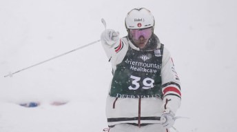 Canada's Mikael Kingsbury celebrates after finishing first in the final of the World Cup men's dual moguls skiing competition, Friday, Feb. 5, 2021, in Deer Valley, Utah. (AP Photo/Rick Bowmer)